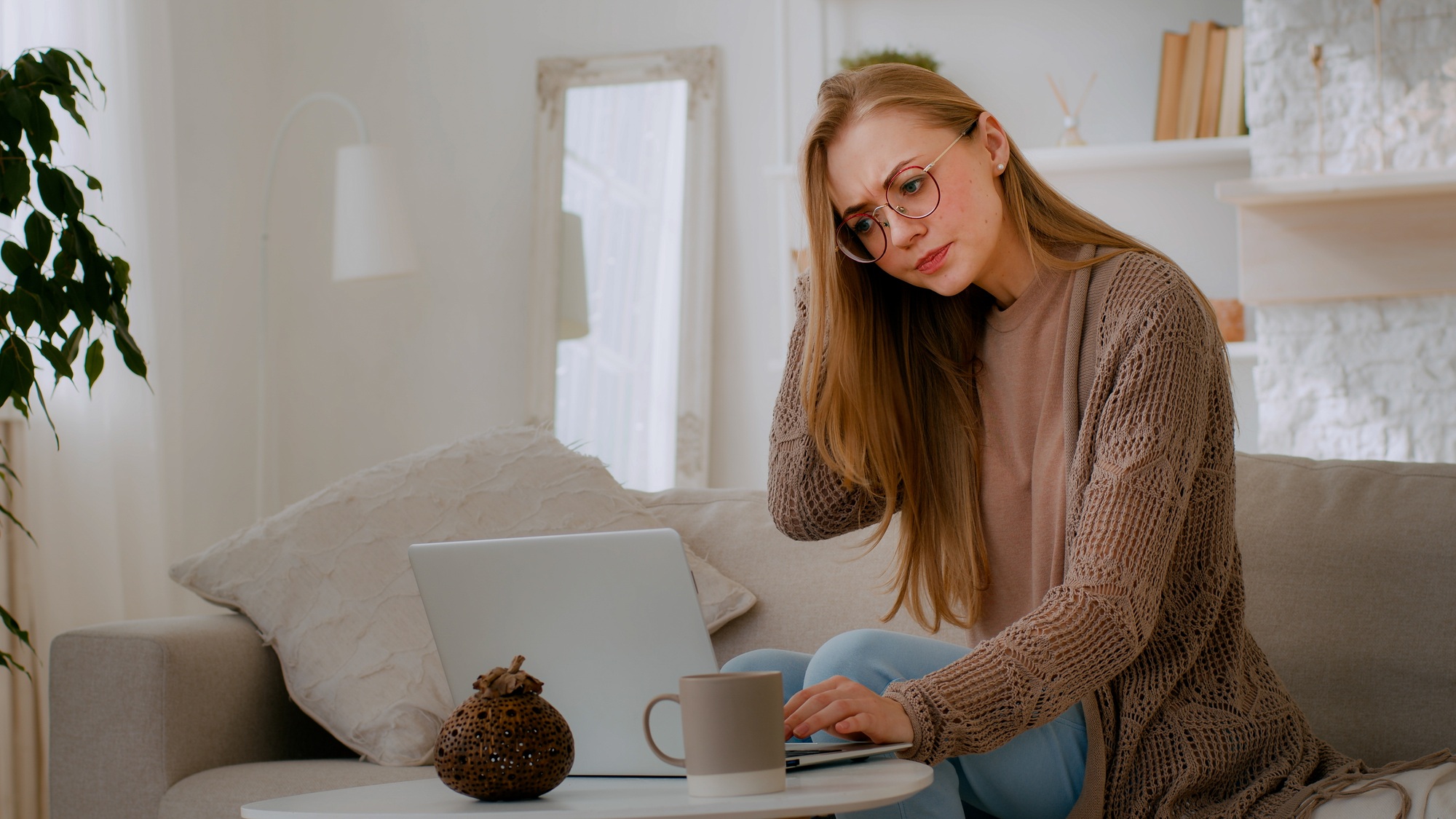 Caucasian woman confused girl with broken laptop worry angry about bad WI-FI Internet connection